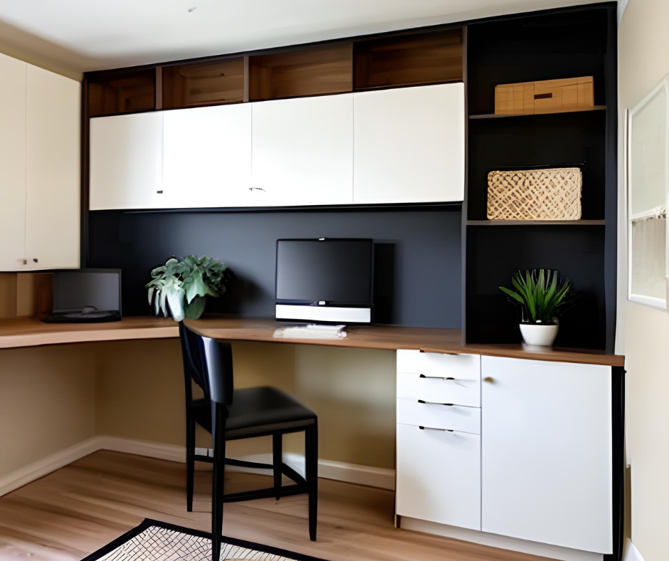 A Home Office Corner With Wall Mounted Desk And Cabinets